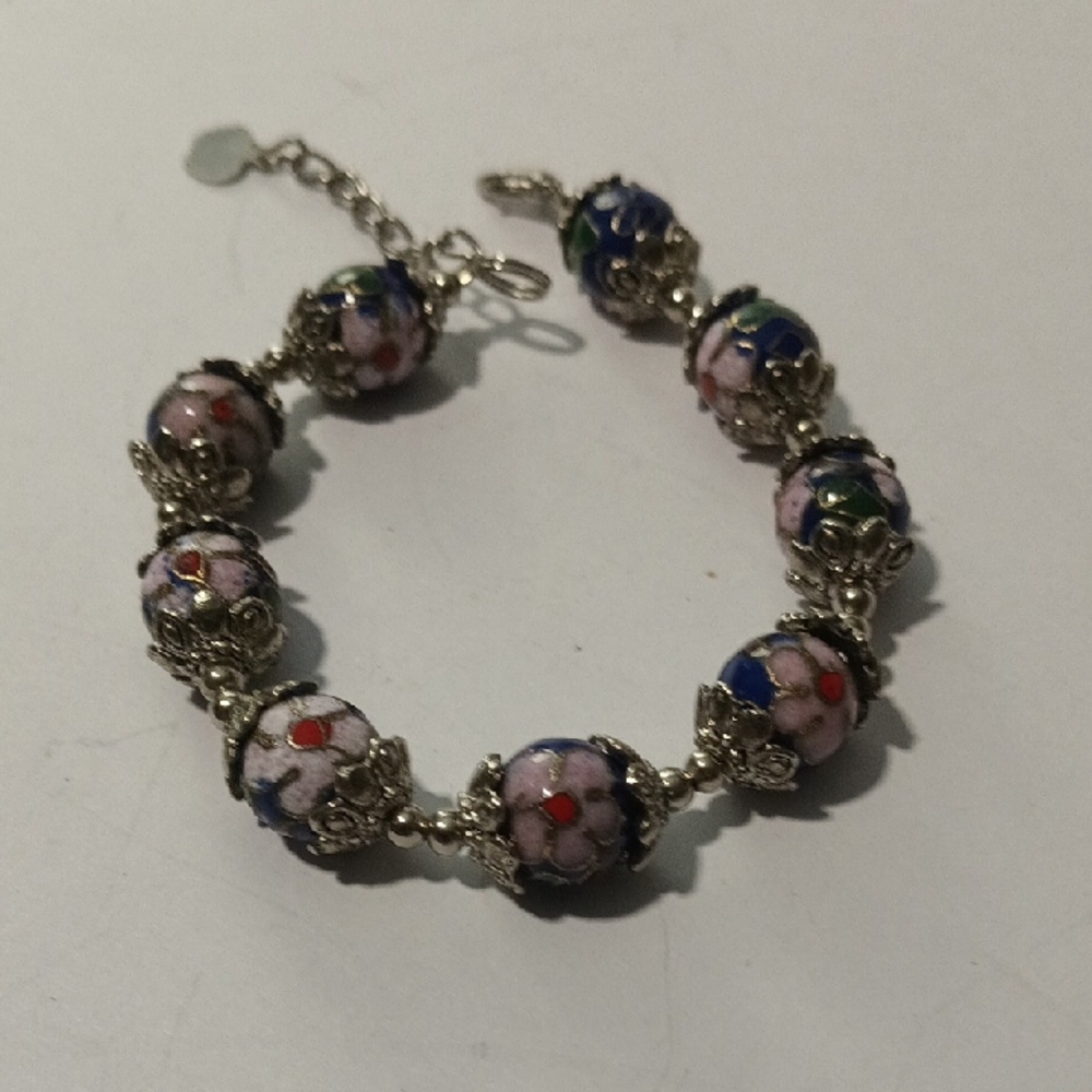 Silver and Pink Beaded Bracelet with Ornate Design